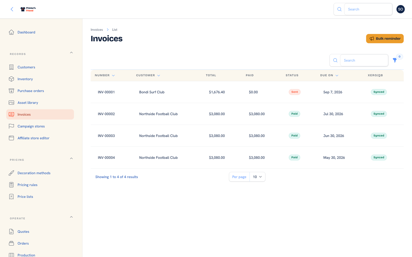 Invoices list showing invoice numbers, customers, totals and payment status
